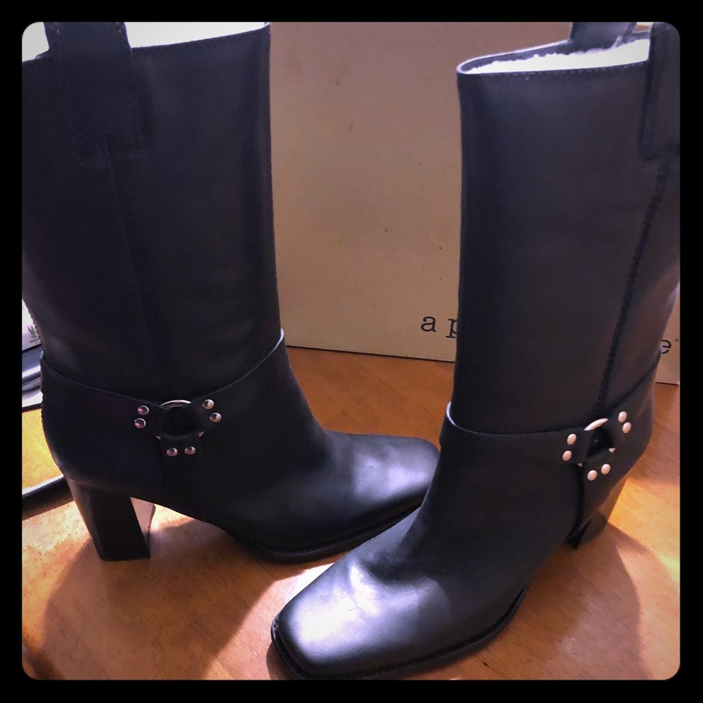Black leather biker style boots.
